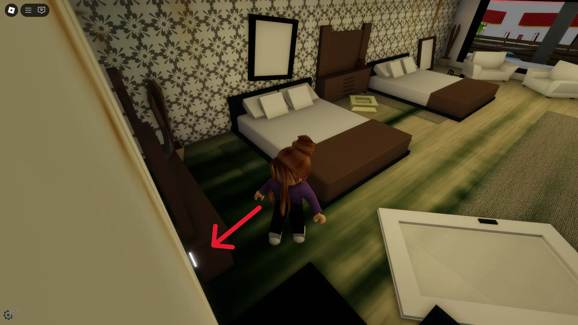 Click on hidden button behind dresser in run down motel room